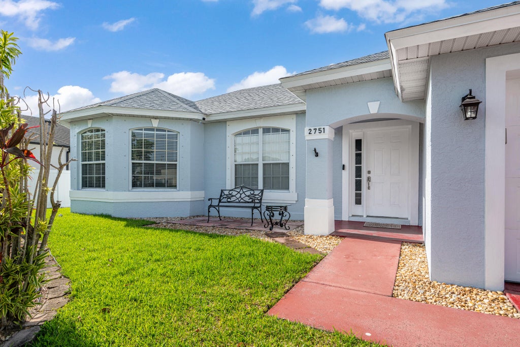Photo of 2751 SW Palace Avenue, Port Saint Lucie, FL 34987 (MLS # B26052853)