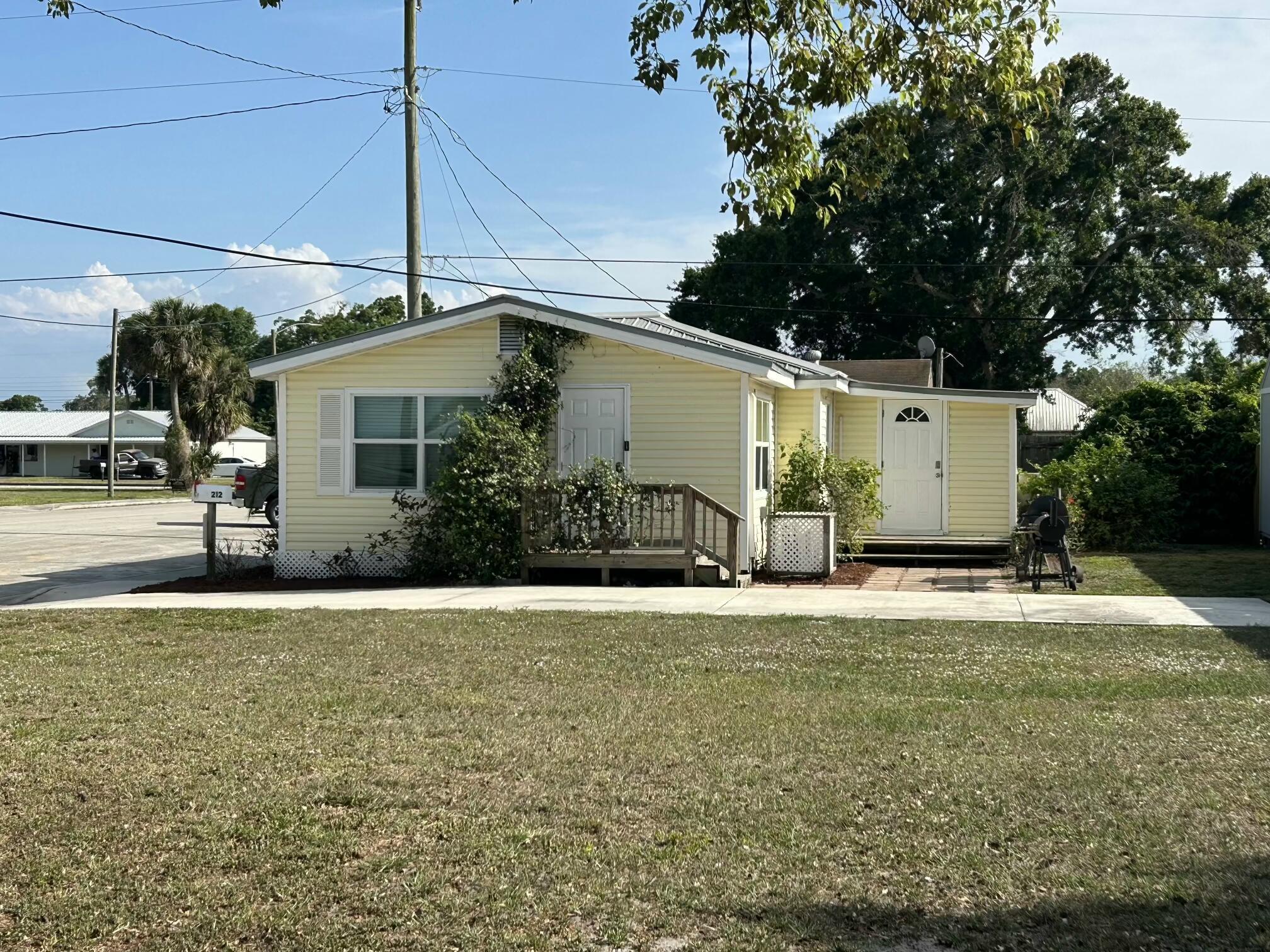 2 Wood frame homes on 1/2 acre in downtown. 1 block off south park street and 2 blocks off Hwy 441. Possible to convert from residential to office space. These homes have been remodeled within the last few years. They have newer windows, doors, a/c, flooring, paint, cabinets and countertops. The exteriors have vinyl siding and metal roofs and the homes have great curb appeal with the recently added landscaping and a privacy fence. You can use these homes as rentals, live in one and rent the other or turn them into office space. Lots of possibilities. Owner may finance with half down.