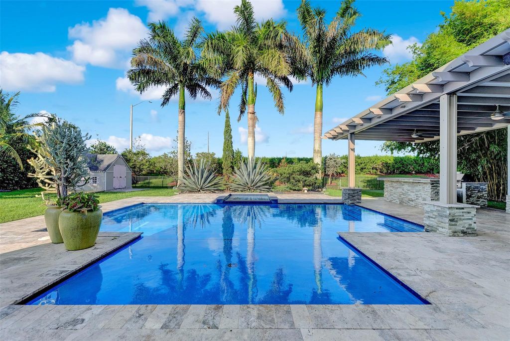 Photo of 8766 Miralago Way, Parkland, FL 33076 (MLS # F10515136)