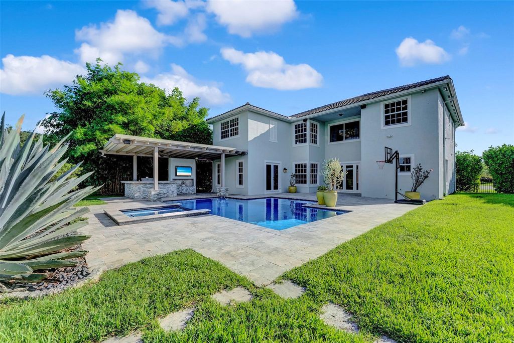 Photo of 8766 Miralago Way, Parkland, FL 33076 (MLS # F10515136)