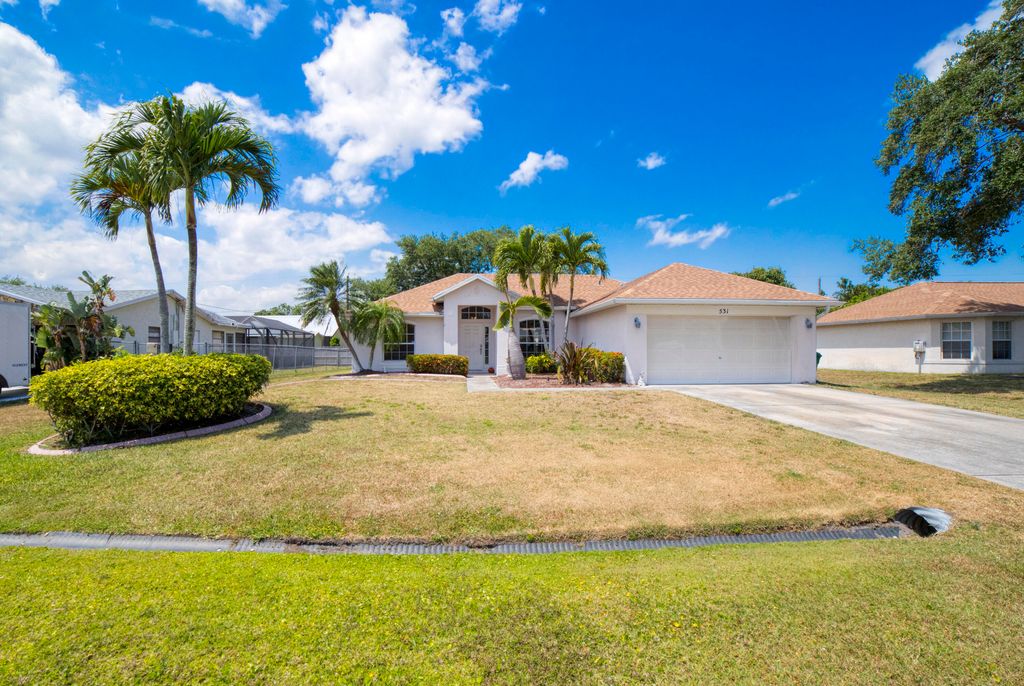 Photo of 531 SE Maple Terrace, Port Saint Lucie, FL 34983 (MLS # R10977198)