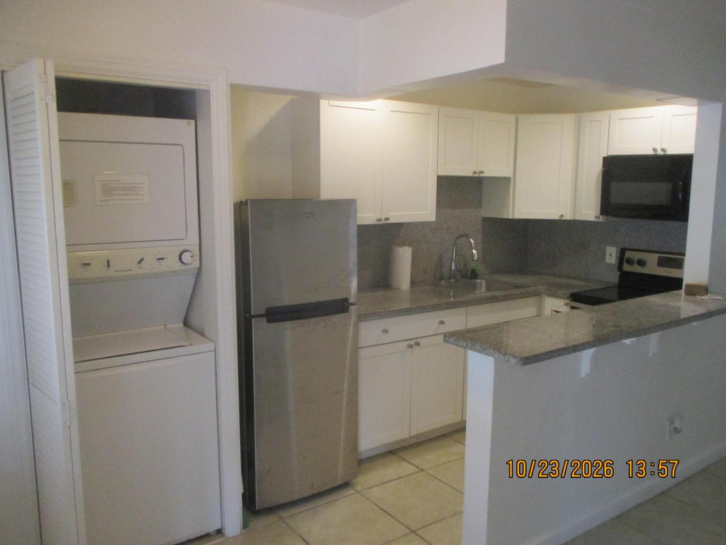 Photo of 605 NE 14TH Place #2, Fort Lauderdale, FL 33304 (MLS # B26092719)