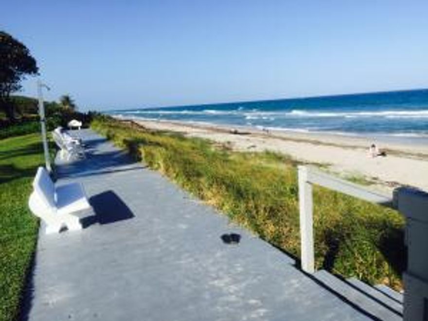 REMODELED 1/1 BY THE OCEAN.  GORGEOUS UPGRADES INCLUDE CHERRY WOOD ENTERTAINMENT CENTER & BOOKCASES W/ LED LITES & FIREPLACE, HAND PLASTER WALLS, LIMESTONE FLOORS & COUNTER TOPS,IMPACT WINDOWS.  CROWN MOLDINGS, HARDWIRED SURROUND SOUND.CEILING FANS ASK FOR LIST OF MORE IMPROVEMENTS.  COMPLEX HAS 200 FT OF BEACH, CLUBHOUSE,POOL. GATED.