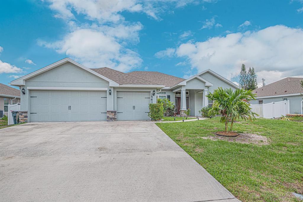 Photo of 3561 SW Princeton Street, Port Saint Lucie, FL 34953 (MLS # R10723332)