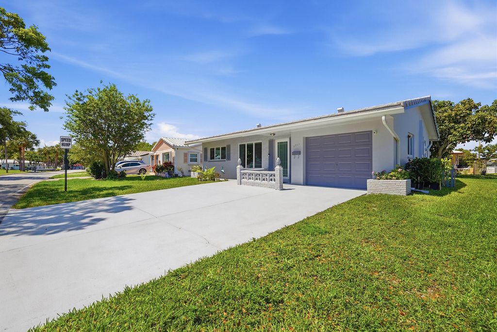 Photo of 5711 NW 84th Terrace, Tamarac, FL 33321 (MLS # B26030606)