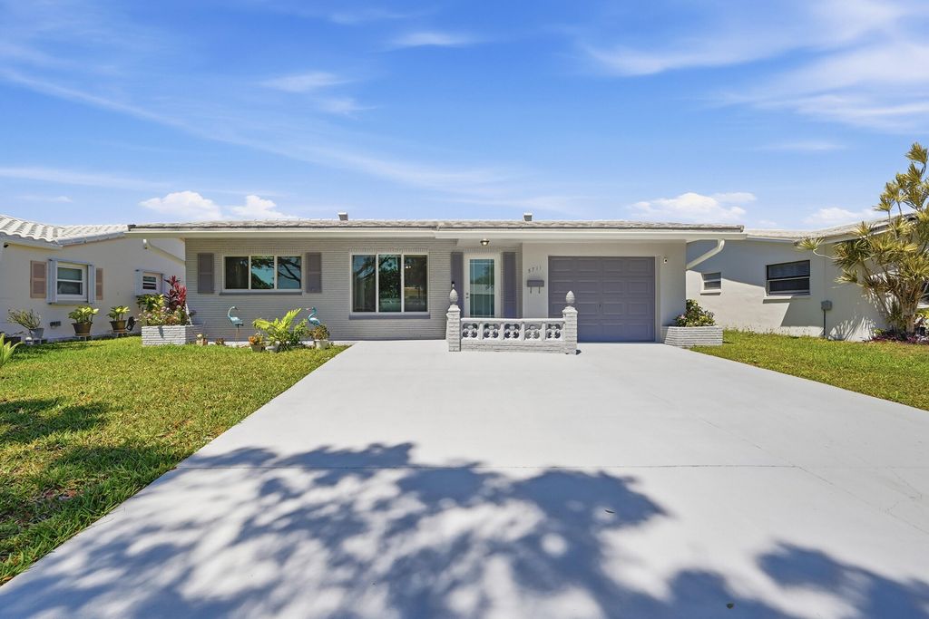 Photo of 5711 NW 84th Terrace, Tamarac, FL 33321 (MLS # B26030606)