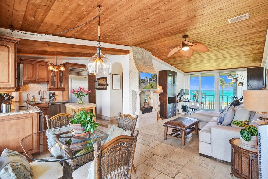 Perched on the third floor in coveted Hillsboro Beach, this one bedroom one bath retreat showcases vaulted tongue and groove wood ceilings and captivating ocean and Intracoastal views from nearly every angle. Updated travertine flooring, high end kitchen appliances and decorative accents throughout create an inviting space reminiscent of refined Old World charm. Private beach access and available boat docks enhance the overall experience of this beautiful property, all set along one of the area's most idyllic and secluded stretches of shoreline- serene, scenic and undeniably perfect. Welcome Home!