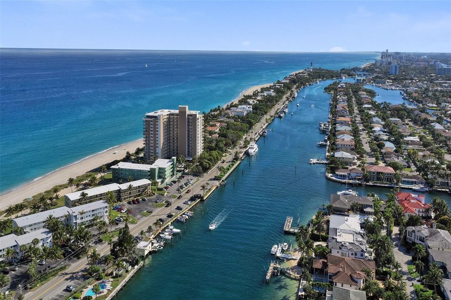 Perched on the third floor in coveted Hillsboro Beach, this one bedroom one bath retreat showcases vaulted tongue and groove wood ceilings and captivating ocean and Intracoastal views from nearly every angle. Updated travertine flooring, high end kitchen appliances and decorative accents throughout create an inviting space reminiscent of refined Old World charm. Private beach access and available boat docks enhance the overall experience of this beautiful property, all set along one of the area's most idyllic and secluded stretches of shoreline- serene, scenic and undeniably perfect. Welcome Home!