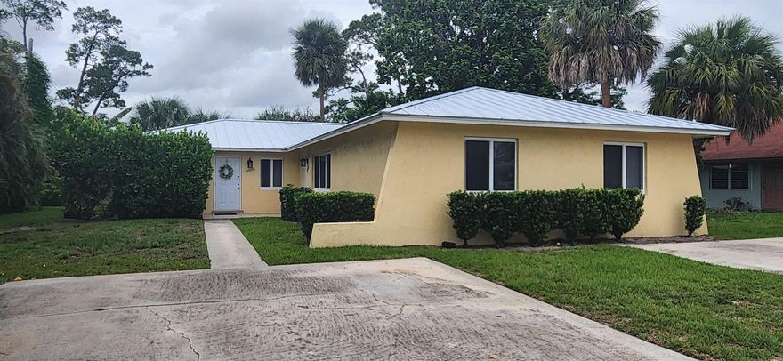 Fully remodeled duplex in Palm Beach Gardens! 2 bed 2 baths, full kitchen, spacious living room, and beautiful bathrooms. 2 parking spaces dedicated to the unit. Additional features include new hurricane windows and doors, new roof, new a/c, and new water heaters making this tenant friendly for your electricity bill!  Property won't last long, vacant and ready for an immediate move in.