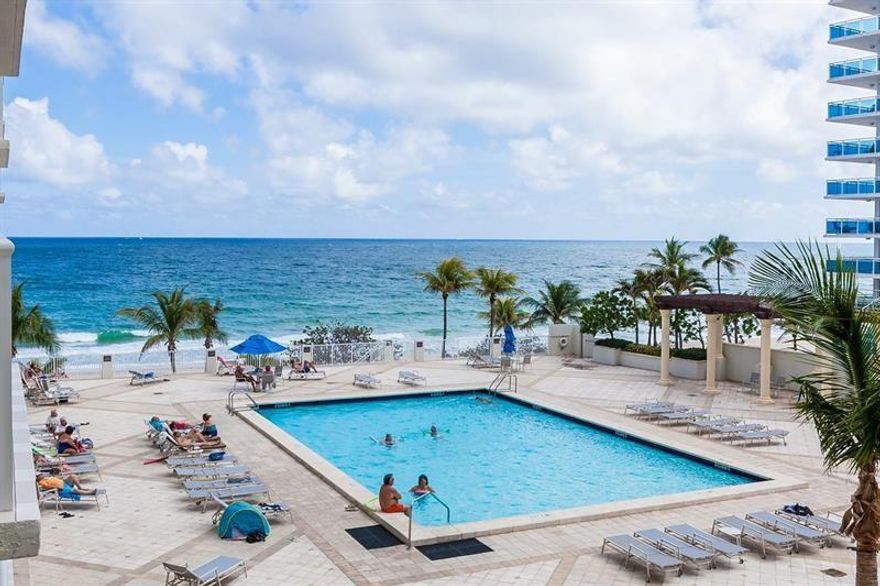 DIRECT SOUTHEAST OCEAN VIEW FROM THIS LOVINGLY CARED FOR 1 BEDROOM, 1/1 1/2 BATH LARGE UNIT ON THE PRESTIGIOUS GALT MILE, TILE THRU OUT, STACKABLE WASHER/DRYER, HUGE CLOSETS, LARGE BEDROOM & SPACIOUS LIVING ROOM, IMPACT WINDOWS & TERRACE DOOR, GLASS TERRACE ALLOWS UNOBSTRUCTED OCEAN VIEW.  DEEDED PARKING, 2 GYMS, PARTY ROOM, 24/7 SECURITY.  JUST STEPS TO THE OCEAN PLUS FINE DINING & NIGHT LIFE.