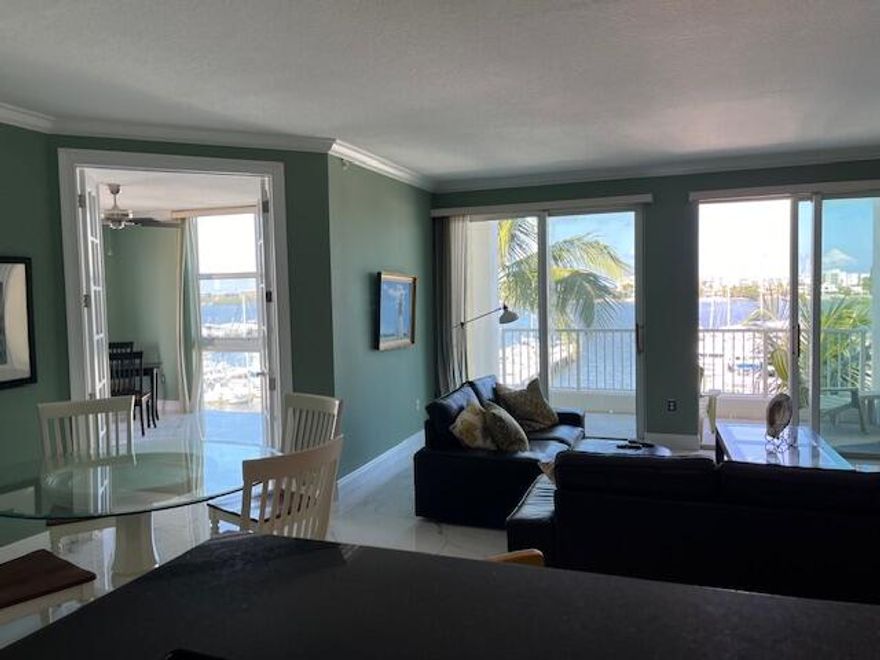 Elegant 3 BR/2 Bath condo with Intracoastal views, offering pristine sunrises and romantic moonrises from the two balconies. Located in the luxury Moorings community in Lantana, the property spans 1,588 square feet and with its marina and water views, this property offers a truly luxurious lifestyle. Conveniently located near the beach and restaurants, and just 10 minutes from Palm Beach International Airport. Don't miss the opportunity to own this impeccable condo in the sought-after Moorings development, a mixed-use community of condo, townhomes and commercial units built in 2005. The community offers many amenities including a parking garage, two pools, two spas, a fitness center with sauna, a club room, and business center. The Moorings includes retail shops and a beautiful marina. Lush landscaping makes the Moorings feel like a tropical resort where your cares are forgotten.