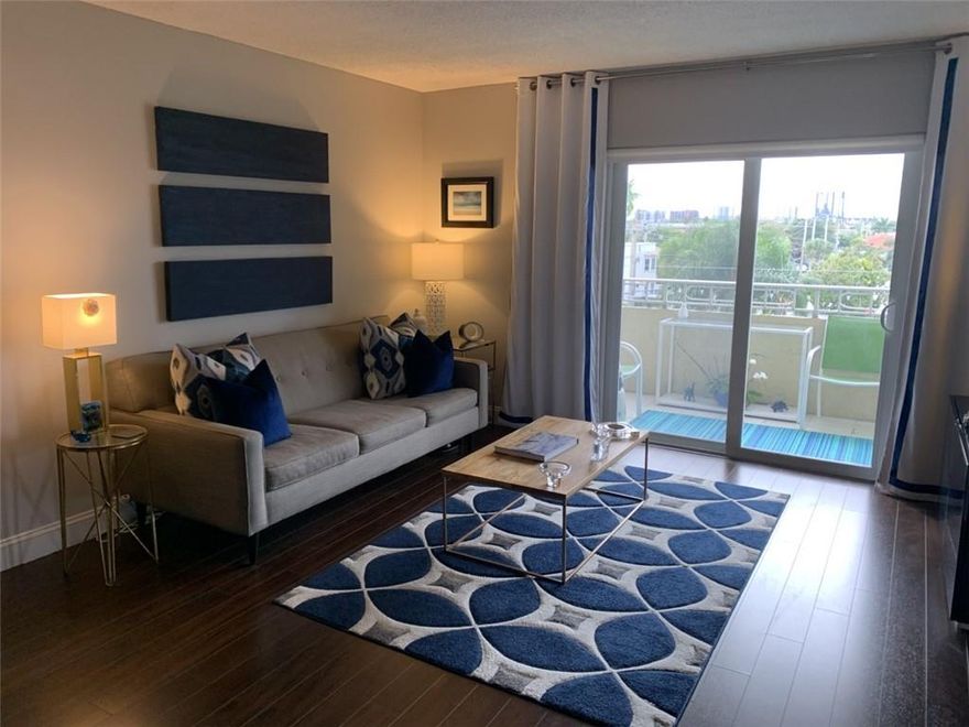 TWO BEDROOM ONE BATH CORNER UNIT IS BEING SOLD FURNISHED.  PERSONAL ITEMS AND ARTWORK DO NOT CONVEY.  TREETOP & DOWNTOWN VIEWS.  FRESHLY PAINTED, AC REPLACED SEPTEMBER OF 2019, HOT WATER HEATER REPLACED SEPTEMBER 2018.  NEW GARBAGE DISPOSAL.  UNIT HAS HURRICANE IMPACT WINDOWS AND SLIDING DOOR.  UNIT ALSO HAS A STORAGE CLOSET LOCATED ON THE SAME FLOOR.  OWNER/AGENT.