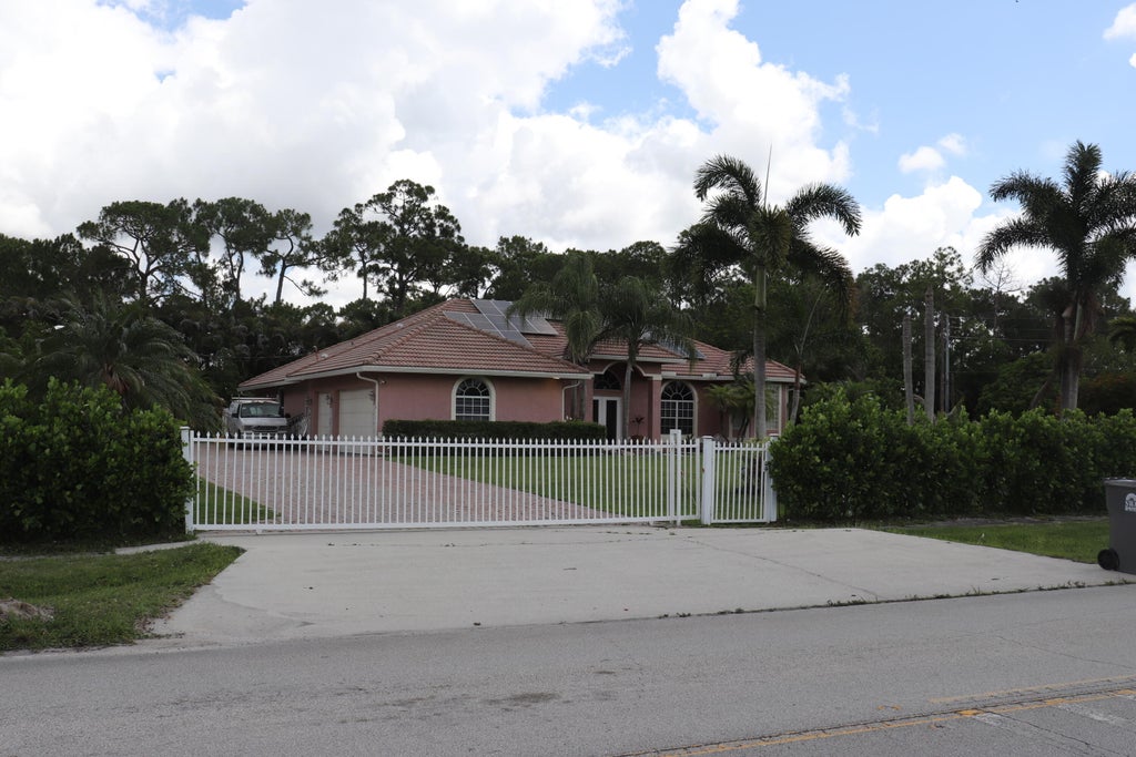Photo of 12517 Temple Blvd, West Palm Beach, FL 33412 (MLS # B26016006)
