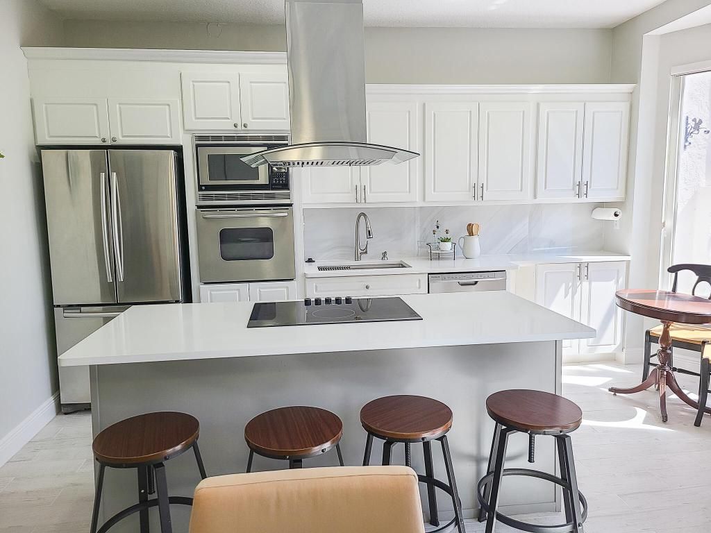 Photo of 780 Seaview Drive, Juno Beach, FL 33408 (MLS # R10928687)