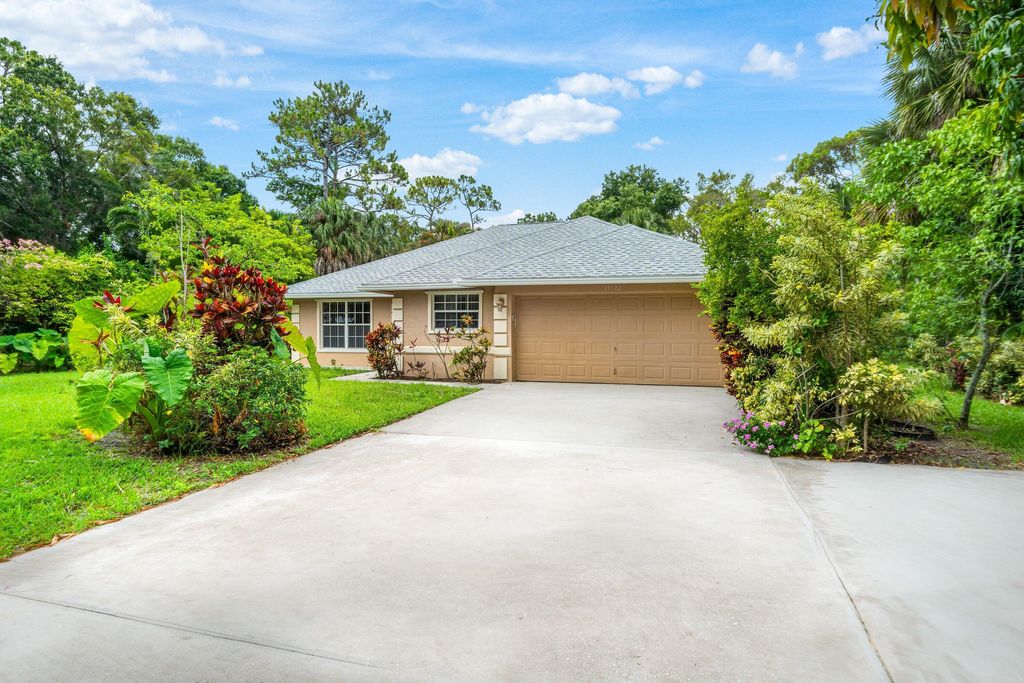 Photo of 15592 99th Street N, West Palm Beach, FL 33412 (MLS # B26035567)