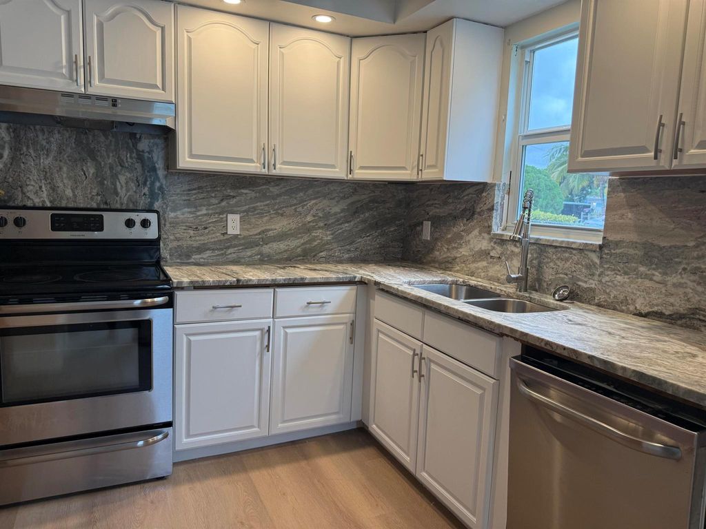 Photo of 509 Plymouth Road, West Palm Beach, FL 33405 (MLS # R11144192)