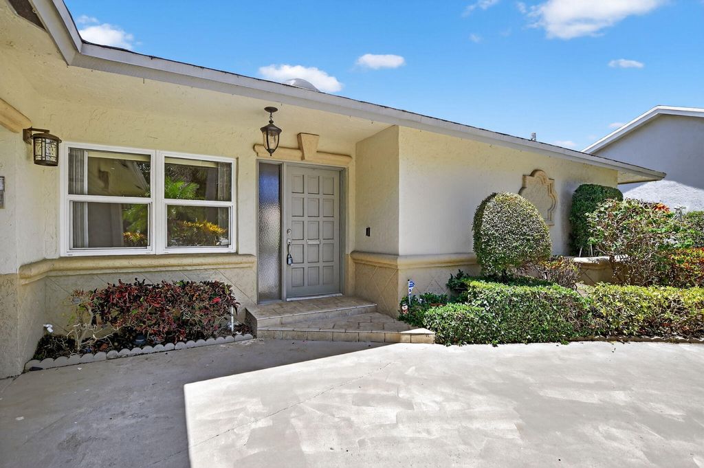 Photo of 6385 Hollandaire Drive E, Boca Raton, FL 33433 (MLS # R11109785)