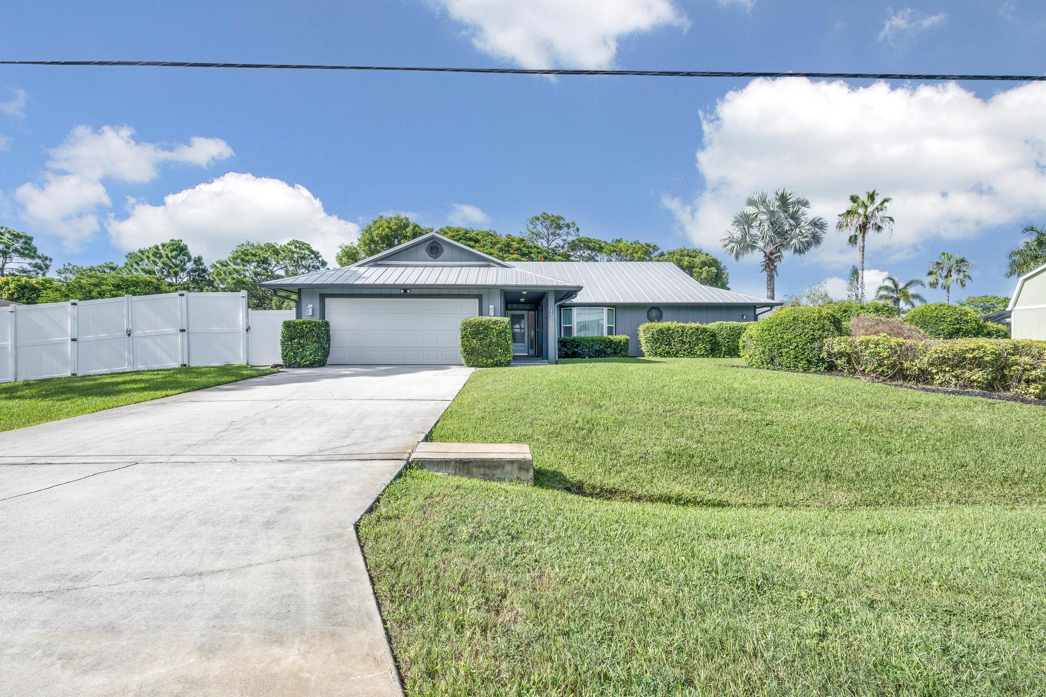 Beautifully updated POOL home, located on a generous .43-acre lot. This home has many recent updates, including all impact rated windows, (2024) 8ft white vinyl fence, (2017) METAL ROOF, (2023) A/C unit, (2020) water heater, pool resurfaced in (2019) and new interior and exterior paint throughout. Brand new custom porcelain tile flooring throughout. Split floor plan. The kitchen is a chef's dream, featuring sleek custom quartz countertops, brand-new stainless steel appliances and a cozy breakfast nook. The large living spaces flow effortlessly into the impressive outdoor area, where you'll find a large swimming pool private oasis being backed up to a wooded area. With all these updates and a prime location, this home offers the perfect blend of comfort, style, and outdoor living.