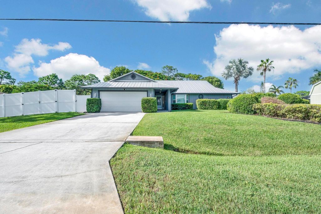 Photo of 1573 SE Blockton Avenue, Port Saint Lucie, FL 34952 (MLS # R11115635)