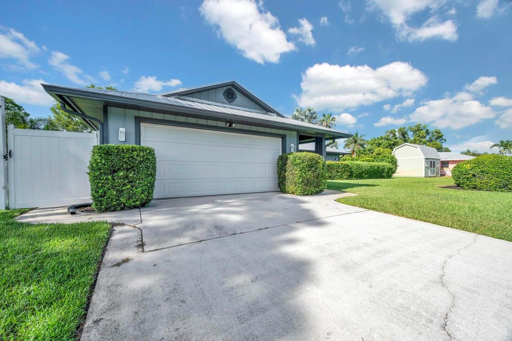 Photo of 1573 SE Blockton Avenue, Port Saint Lucie, FL 34952 (MLS # R11115635)