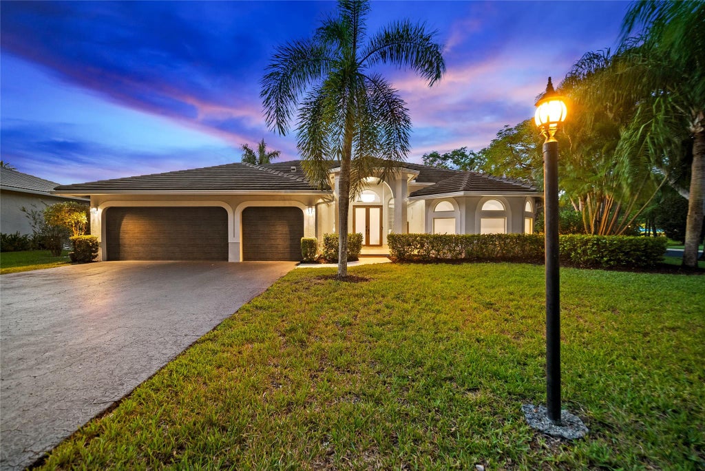 Photo of 10201 NW 62nd Drive, Parkland, FL 33076 (MLS # F10508816)