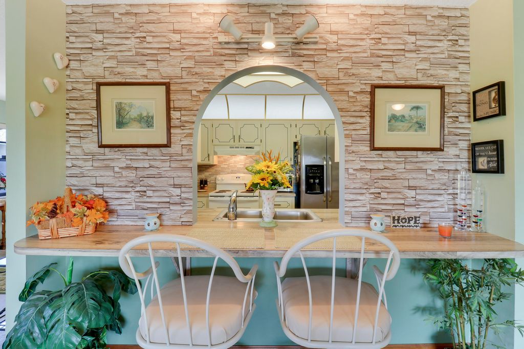 Photo of 2341 SE Leithgow Street, Port Saint Lucie, FL 34952 (MLS # R11034542)