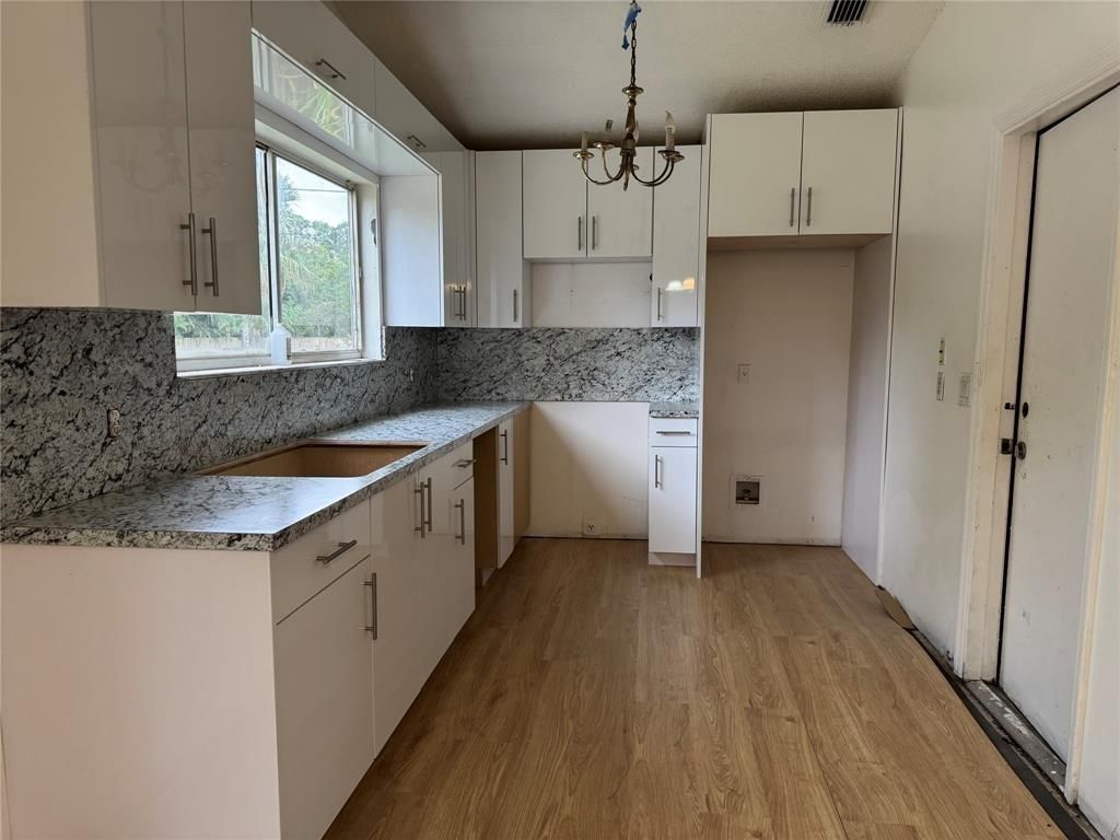 Photo of 2417 SW Summit Street, Port Saint Lucie, FL 34984 (MLS # F10508434)