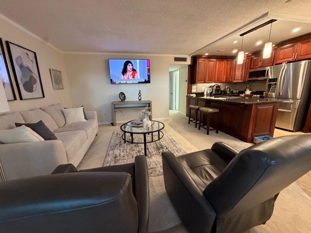 Photo of 43 NORMANDY A #43, Delray Beach, FL 33484 (MLS # B26069518)