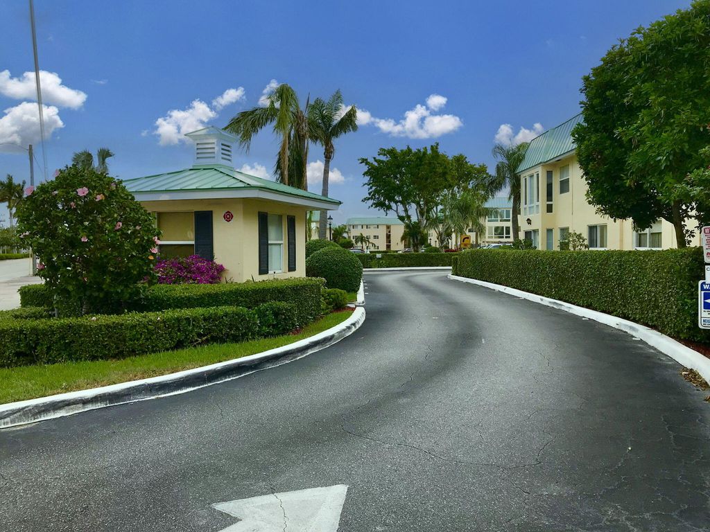 Photo of 21 Colonial Club Dr #305, Boynton Beach, FL 33435 (MLS # R11012299)