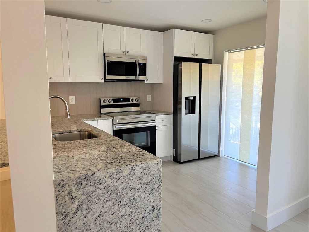 Photo of 5151 W Club 203 Circle #203, Boca Raton, FL 33487 (MLS # R11077472)