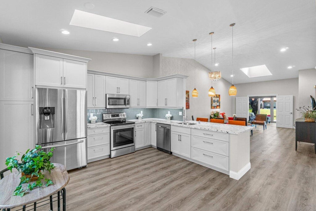 Photo of 6364 Mill Pointe Circle, Delray Beach, FL 33484 (MLS # R10917846)