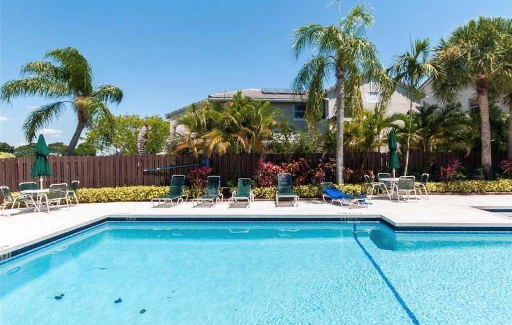 Welcome to this well-maintained 3-bedroom, 2.5-bath townhome in a prime Davie location. This spacious home features updated bathrooms as well as an updated range, dishwasher, and washer/dryer. The eat-in kitchen opens to a private screened patio—perfect for relaxing or entertaining.
Great office space/alcove in the primary bedroom.
The converted garage, now a large family room, also has added storage space.
All windows have hurricane accordion shutters, too.
Les Chateaux is a well-kept community with a neighborhood feel.
Just minutes from I-75, you’ll enjoy quick access to major shopping, dining, top-rated medical facilities, and beautiful nearby parks. It’s a perfect balance of comfort, convenience, and community.
