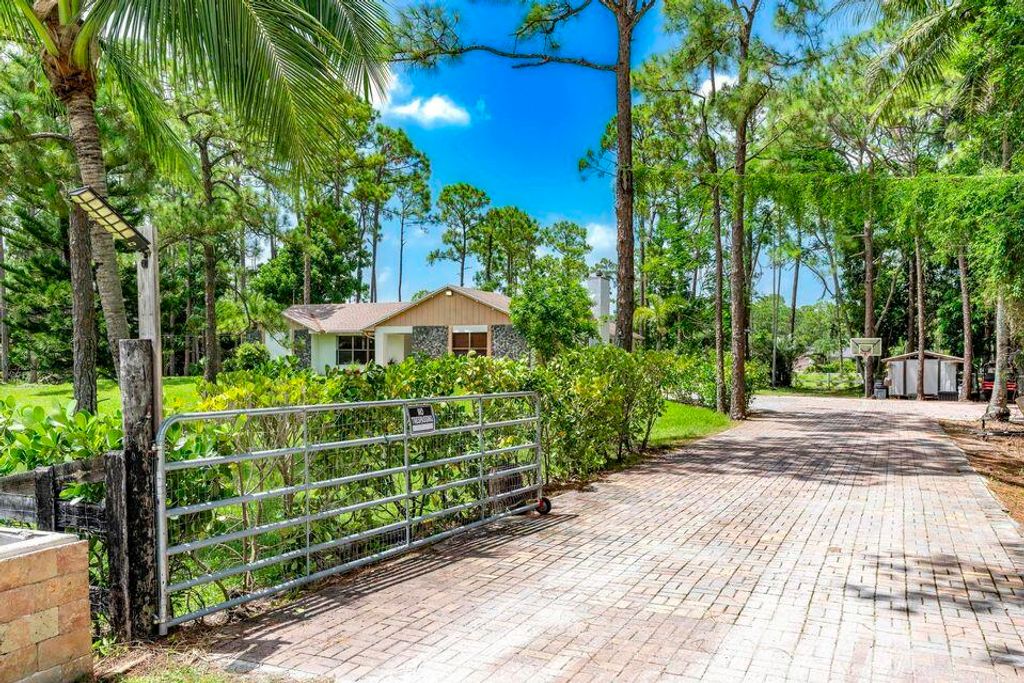 Photo of 15211 60th Place N, Loxahatchee, FL 33470 (MLS # R11166203)