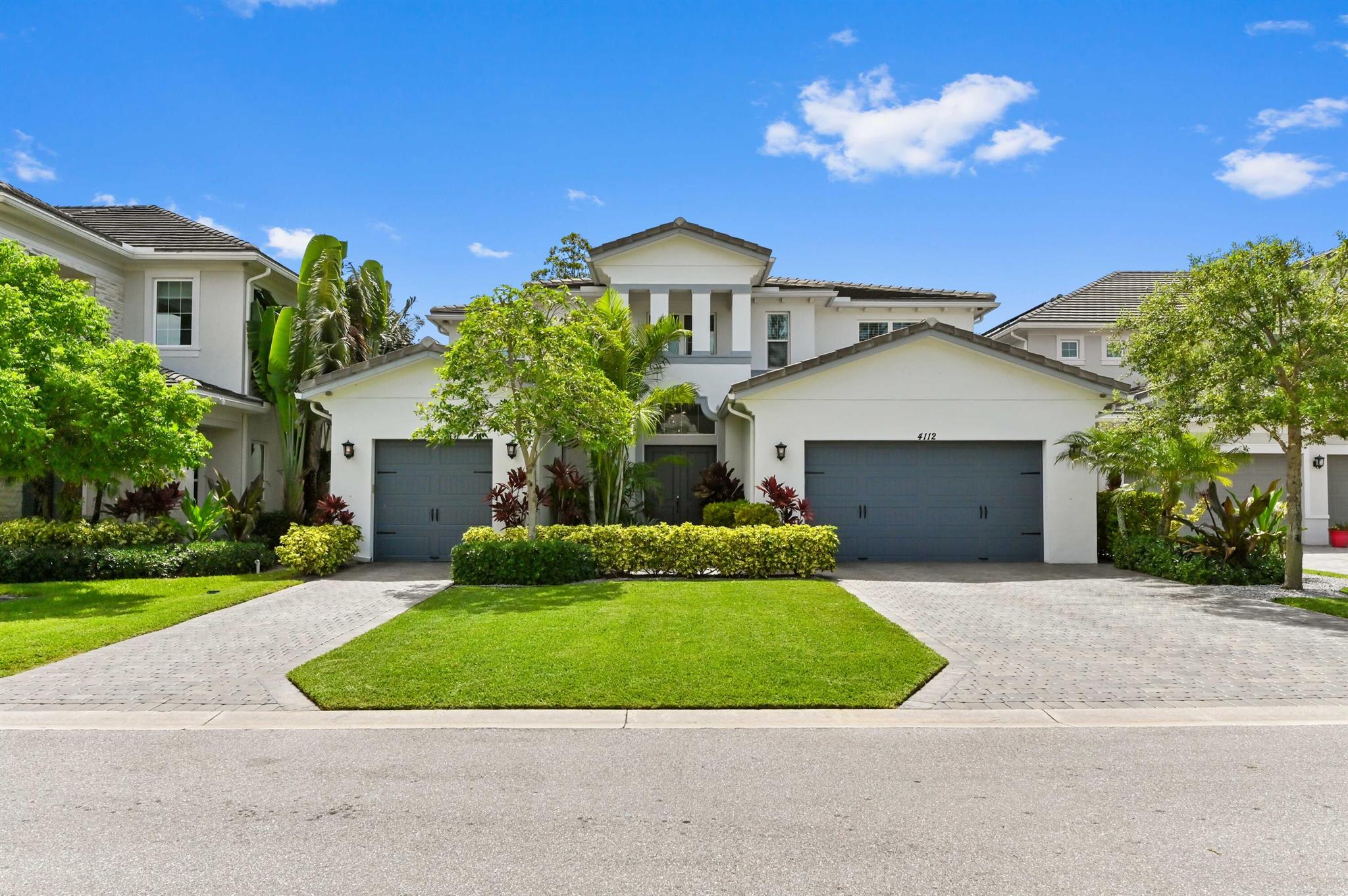 Welcome to an exceptional opportunity within the prestigious gated community of Cypress Royale in Lake Worth, FL. This magnificent 2-story single-family modern home offers an expansive 6 bedrooms, 5 full bathrooms and 2 half bathrooms, providing unparalleled space and luxury for even the largest of families on one of the largest lots in the community. Upon entering, you'll be greeted by soaring high ceilings and an elegant staircase, setting a grand tone. The main level thoughtfully includes a formal dining room and two convenient half bathrooms, perfect for guests or a bustling household. The heart of this home unfolds into vast open living, dining, and kitchen areas, designed for seamless flow and effortless entertaining.