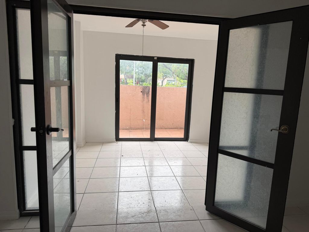 Photo of 2700 S University Drive #4c, Davie, FL 33328 (MLS # B26027800)