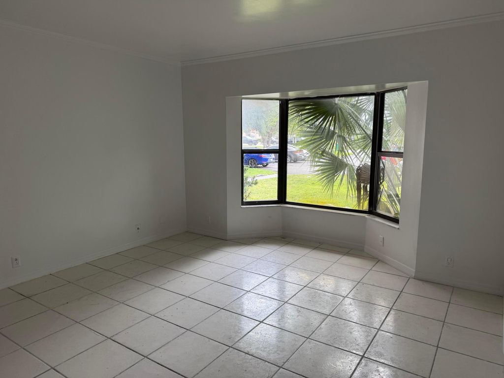 Photo of 2700 S University Drive #4c, Davie, FL 33328 (MLS # B26027800)