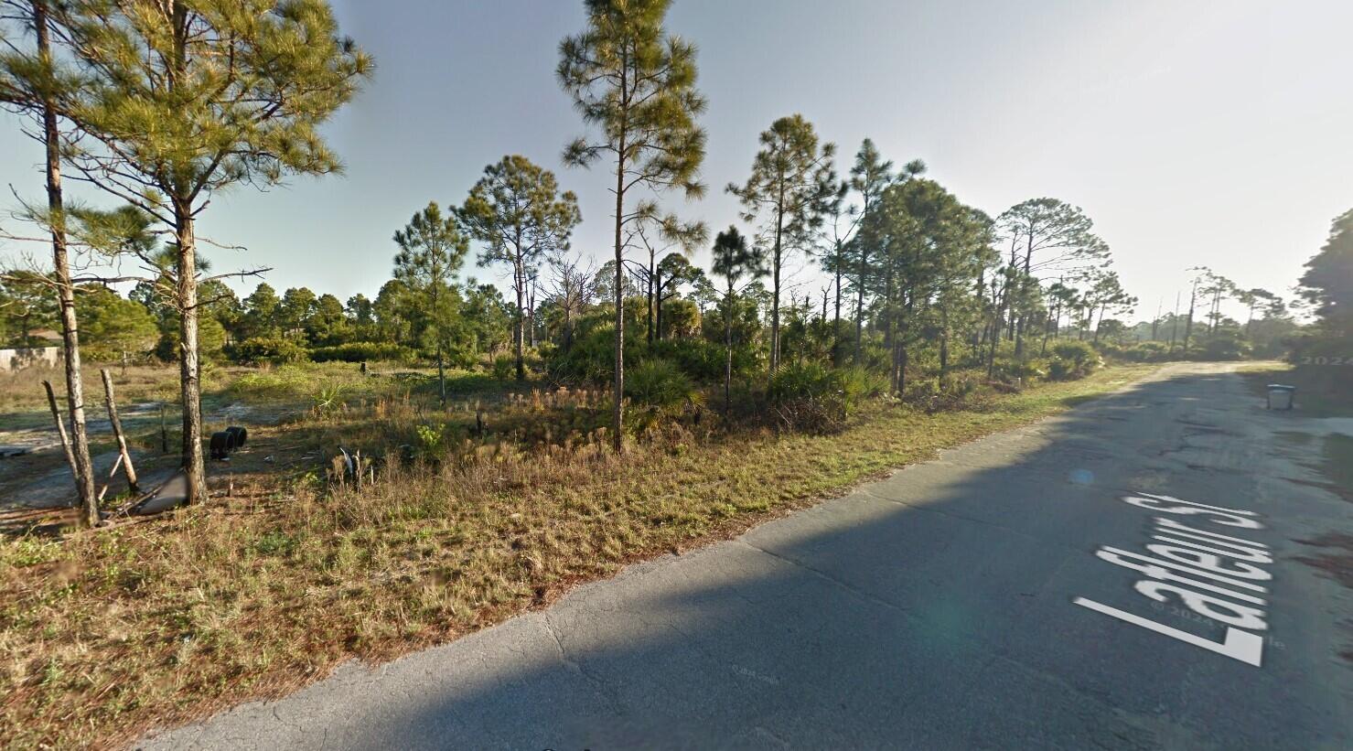 Discover a prime investment opportunity in growing Palm Bay. Construct 4 income-generating homes or build the home of your dreams on this attractive four 80 x 125 lots making it almost one acre. Newer homes already in the area waiting for your home or homes to be built. Quiet neighborhood but minutes from shopping, doctors' office, beaches and restaurants. Seize this incredible chance! Among the most competitively priced in the area, act now to claim this property as your own.