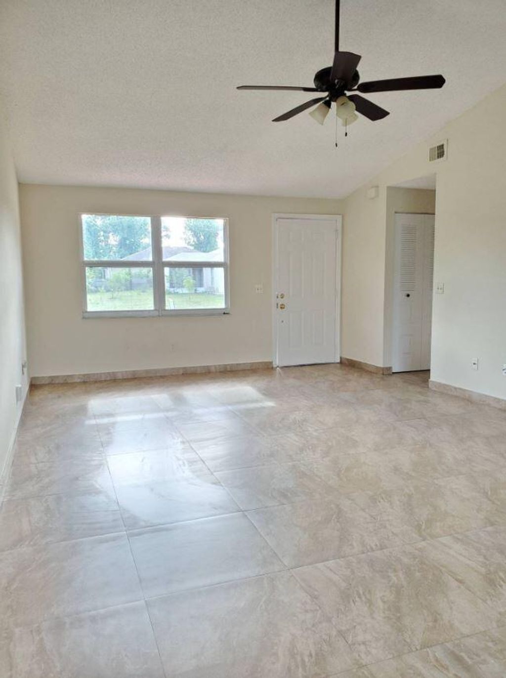 Photo of 1734 SW Carolina Street, Port Saint Lucie, FL 34953 (MLS # R11164453)