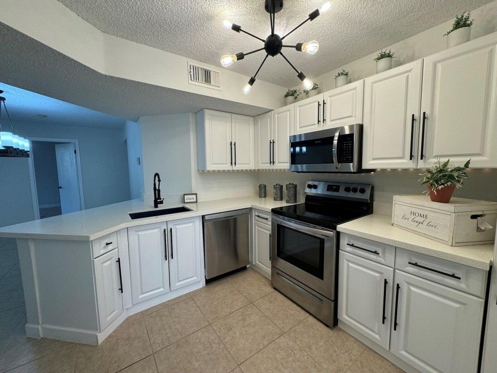 Photo of 8901 Wiles Road #208, Coral Springs, FL 33067 (MLS # F10463420)