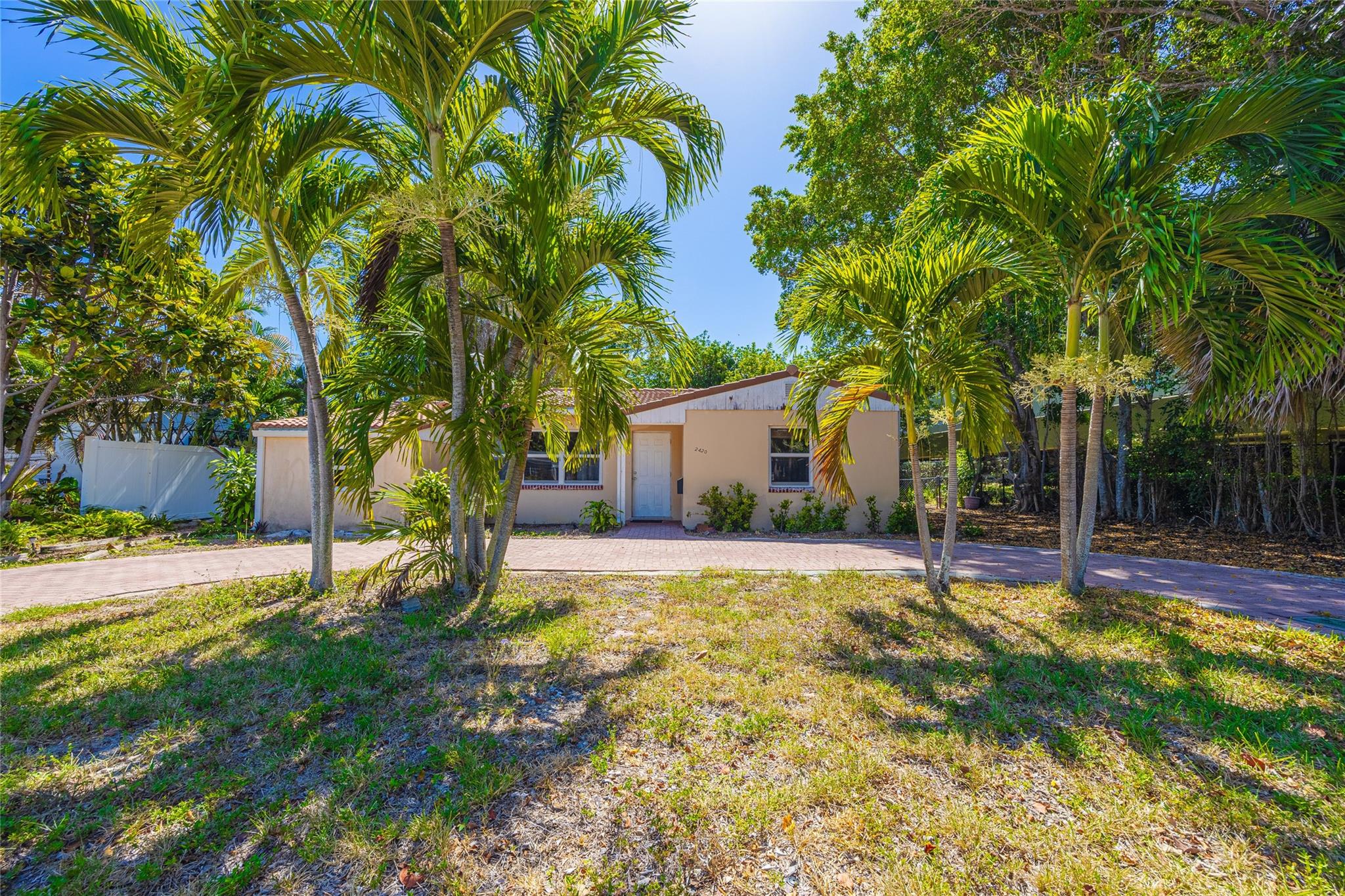 Ready for your renovations—turn it into the home of your dreams! Investors, Unbeatable location popular with locals and Northeastern buyers alike. This fantastic opportunity is highly sought after in Wilton Manors! This 3BD/2BA ranch-style home sits on a 9,300 SF lot. The oversized backyard offers plenty of space for a pool and more. 1,330 SF of living area. Features include terrazzo floors, a 2010 barrel roof, impact windows, an electric panel, a 2023 A/C, a newer water heater, and a circular paver driveway. The former garage has been converted into a third bedroom. The large backyard provides ample room for a pool. Prime location just off Wilton Dr—close to beaches, shopping, dining, and nightlife. Priced to sell quickly—don't miss it! Priced to sell—don't miss out!