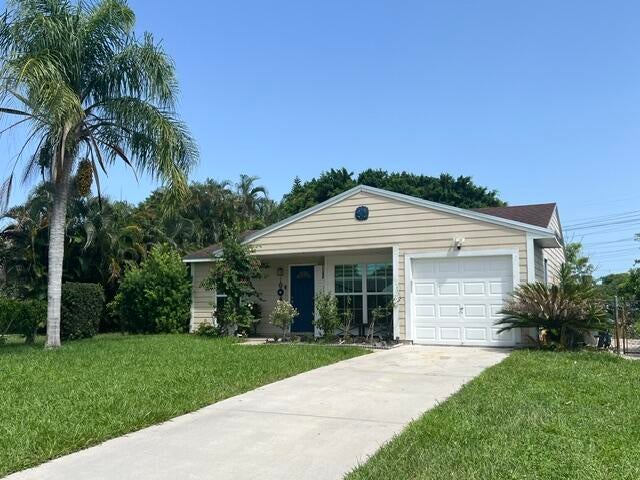 Photo of 9145 Chrysanthemum Drive, Boynton Beach, FL 33472 (MLS # B26052004)