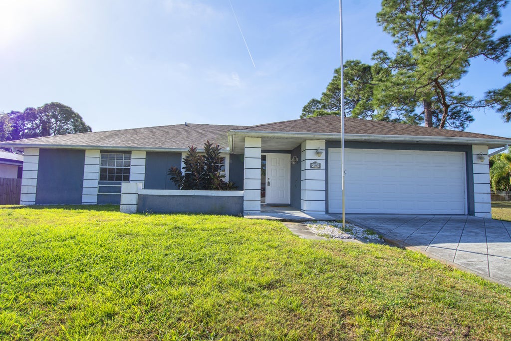 Photo of 366 SE Strait Avenue, Port Saint Lucie, FL 34983 (MLS # R10969240)