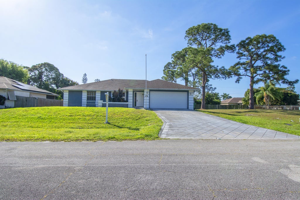 Photo of 366 SE Strait Avenue, Port Saint Lucie, FL 34983 (MLS # R10969240)