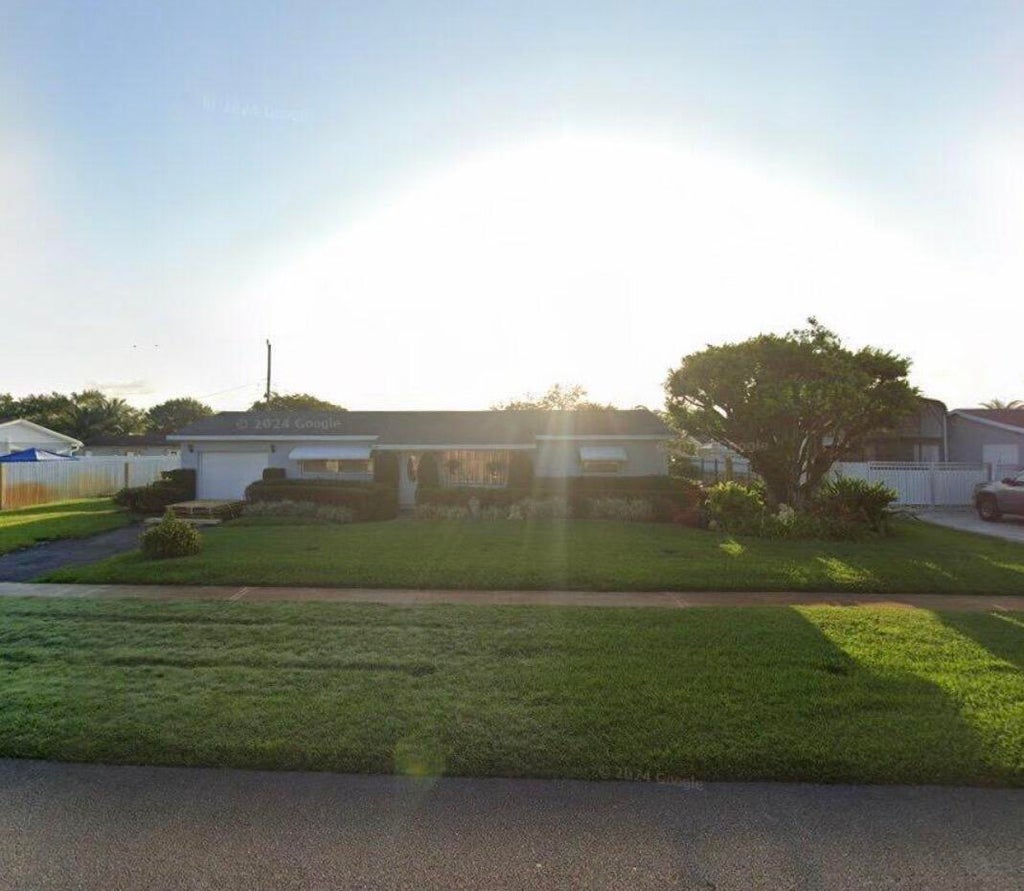 Photo of 1656 KUDZA Road, West Palm Beach, FL 33415 (MLS # B26073508)