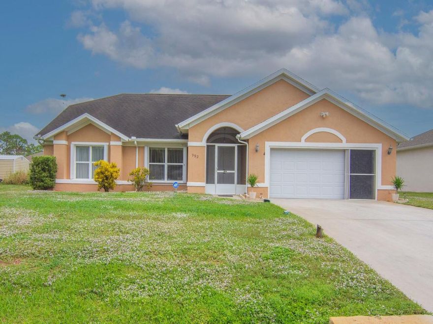 Step into this beautifully maintained custom-built home packed with thoughtful upgrades and everyday conveniences. You'll enjoy tile flooring throughout, a versatile office/flex room, and peace of mind with updated systems including a 2019 A/C.
This home is truly move-in ready with accordion storm shutters, a whole-home vacuum, outdoor shower, garage door screen, Hot Tub, and exceptional storage and closet space rarely found at this price point.
With no HOA, original home plans included, and meticulous care inside and out, this is a tremendous opportunity you won't want to miss.