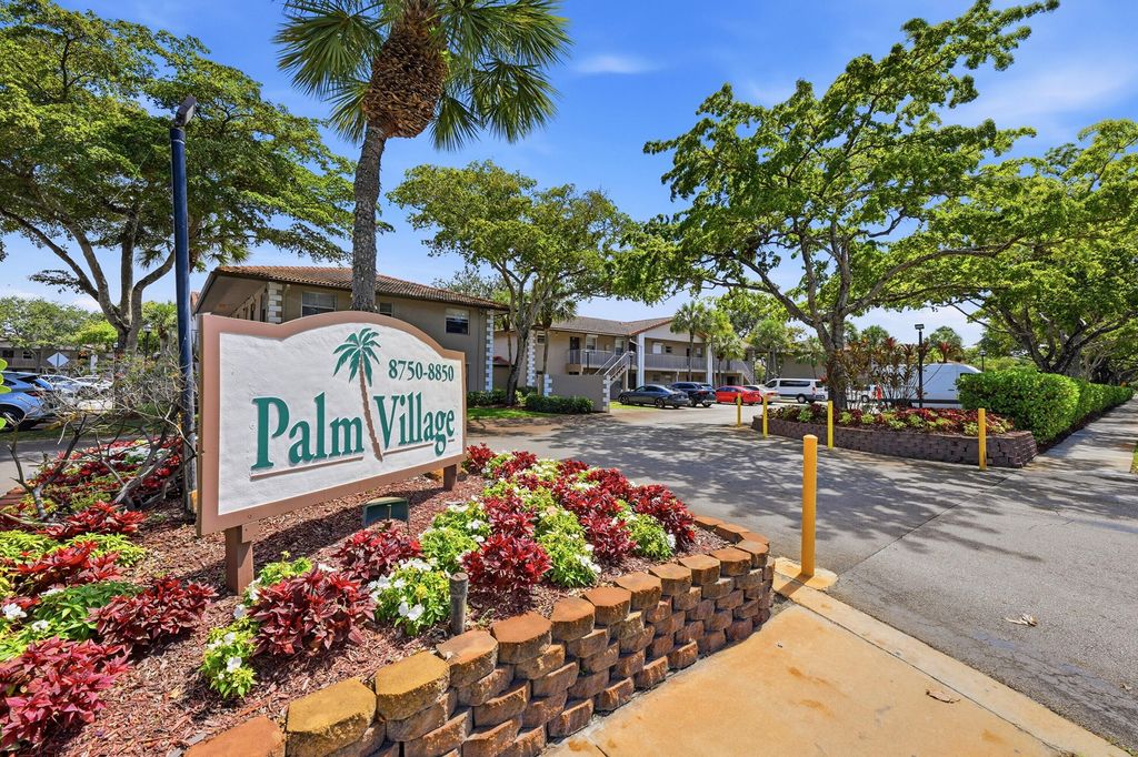 Photo of 8840 Royal Palm Boulevard #206-7, Coral Springs, FL 33065 (MLS # B26039646)