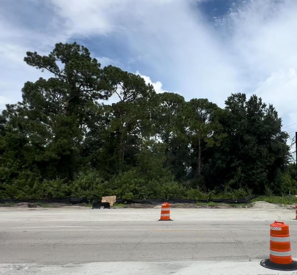 Photo of 3421 SW Port St Lucie Boulevard, Port Saint Lucie, FL 34953 (MLS # R11015914)