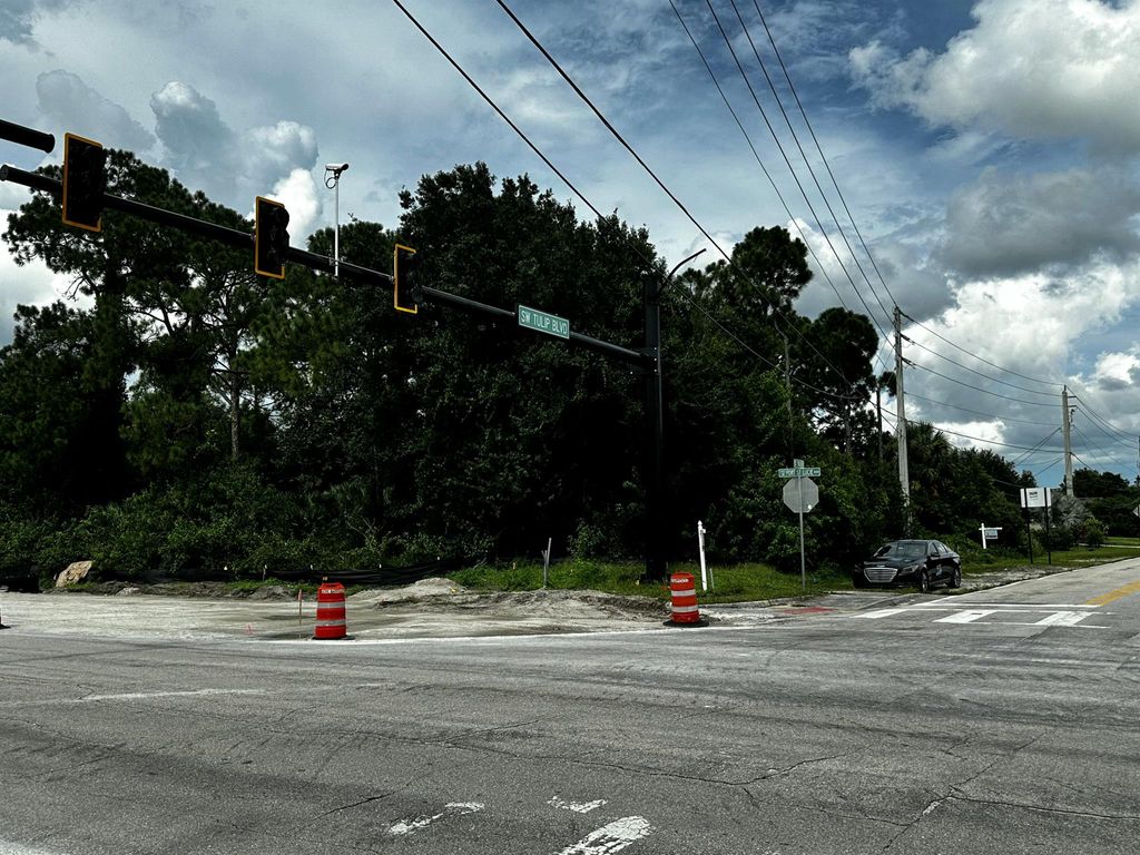 Photo of 3421 SW Port St Lucie Boulevard, Port Saint Lucie, FL 34953 (MLS # R11015914)