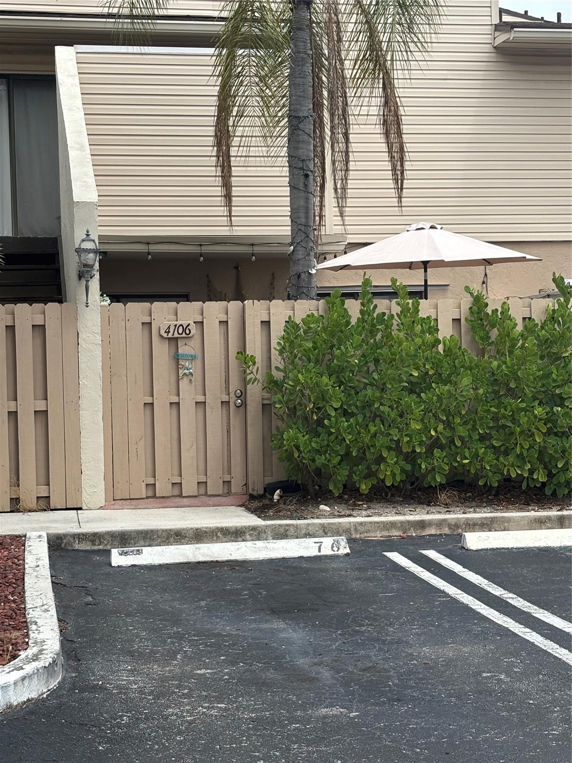 Don't miss out on this beautiful patio townhouse in a gated community close to downtown, I95, the Palm Beach Mall and countless restaurants. This unit offers a private fenced in first floor patio entrance that leads you to a tastefully designed living room, full-size washer and dryer, two ample bedrooms with full baths one that can be an additional master bedroom or can be a combo guest bath by using the pocket door.
The kitchen is open and well appointed with plenty of counter space. This unit is a must see, and promises to empress.