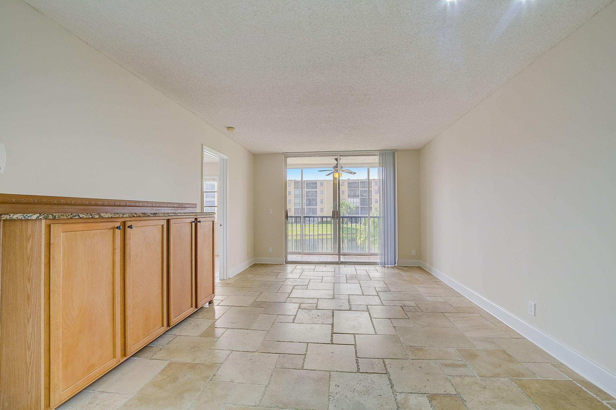 Pristine, & renovated lake view unit in Cascades of Lauderhill. This spacious 2 bed, 2 bath, boasts beautiful views of the lake, a screened-in patio, an open & functional layout, upgraded kitchen & bath, stainless steel appliances, spacious bedrooms with ensuite bath & walk in closet in primary. In-unit full-size wash & dry. Stone tile floors throughout. Community features clubhouse, pool, spa, billiards, sauna, jogging path, tennis, & gym. Plus, extra storage for the unit, & an elevator. Assigned parking w guest parking available. Easy access to restaurants, supermarkets, shopping, & highways (turnpike, sawgrass/I-75, I-595). HOA req 700 min FICO & a min of $40k ann income. No pets, however, ESA's & SA's are allowed with proper documentation. No pickup trucks, trailers allowed.